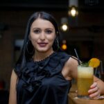 bartender pouring cocktail
