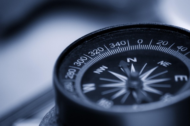 Illustration of a graduate looking at a compass with Proverbs 3:5-6 overlaid (verse for graduating)